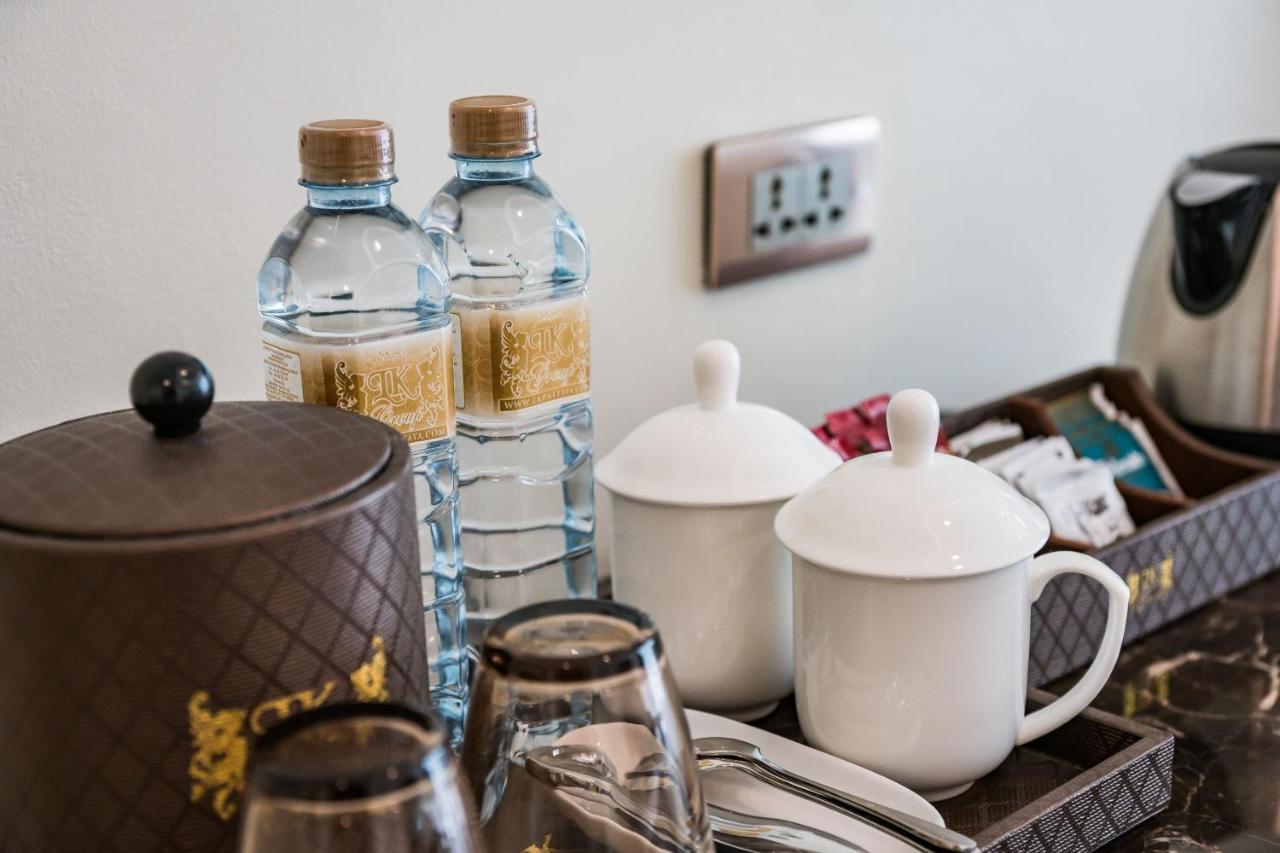 Lk Emerald Beach - Sha Extra Plus Паттая Екстер'єр фото Bottled water in a hotel room